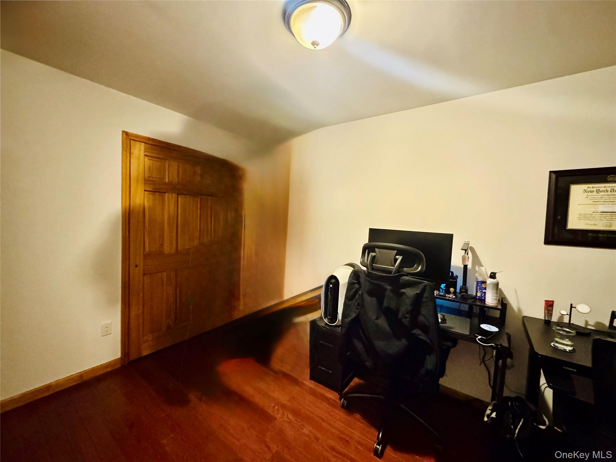 37-49 81st Street, Unit 3A Queens, NY 11372 - Photo 19 of 20 a living room with furniture and wooden floor