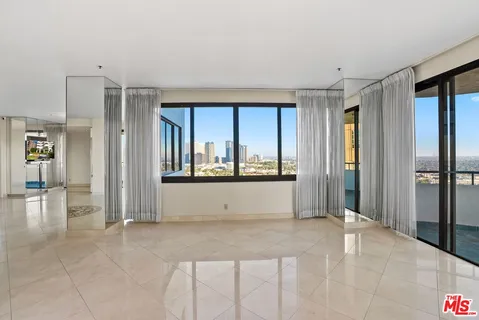 a view of room with window and hardwood floor