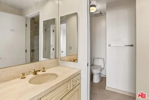 a swimming pool view with a outdoor seating