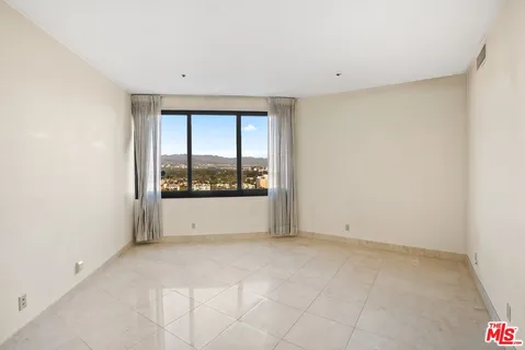 a view of a city with tall buildings