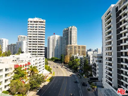 a view of a city with tall buildings
