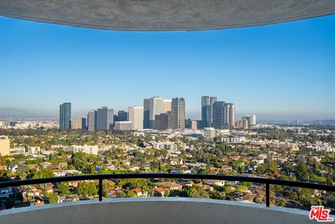 a bathroom with a glass door shower