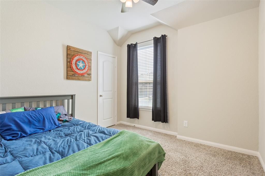 10204 Driskill Drive Waco, TX 76708 - Photo 22 of 30 a bedroom with a bed and a window
