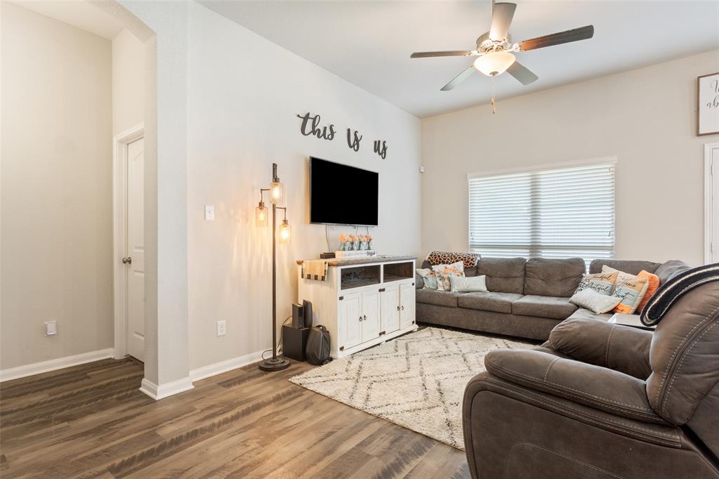 10204 Driskill Drive Waco, TX 76708 - Photo 7 of 30 a living room with furniture and a flat screen tv