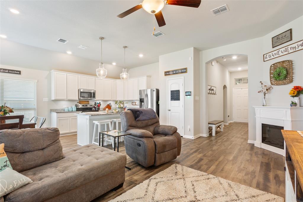 10204 Driskill Drive Waco, TX 76708 - Photo 8 of 30 a living room with furniture and a fireplace