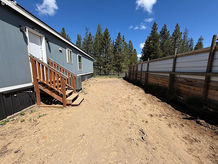 16125 Hawks Lair Road La Pine, OR 97739 - Photo 32 of 35 a view of wooden roof deck