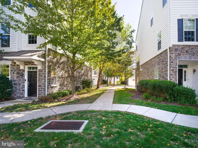 a view of a building with a yard