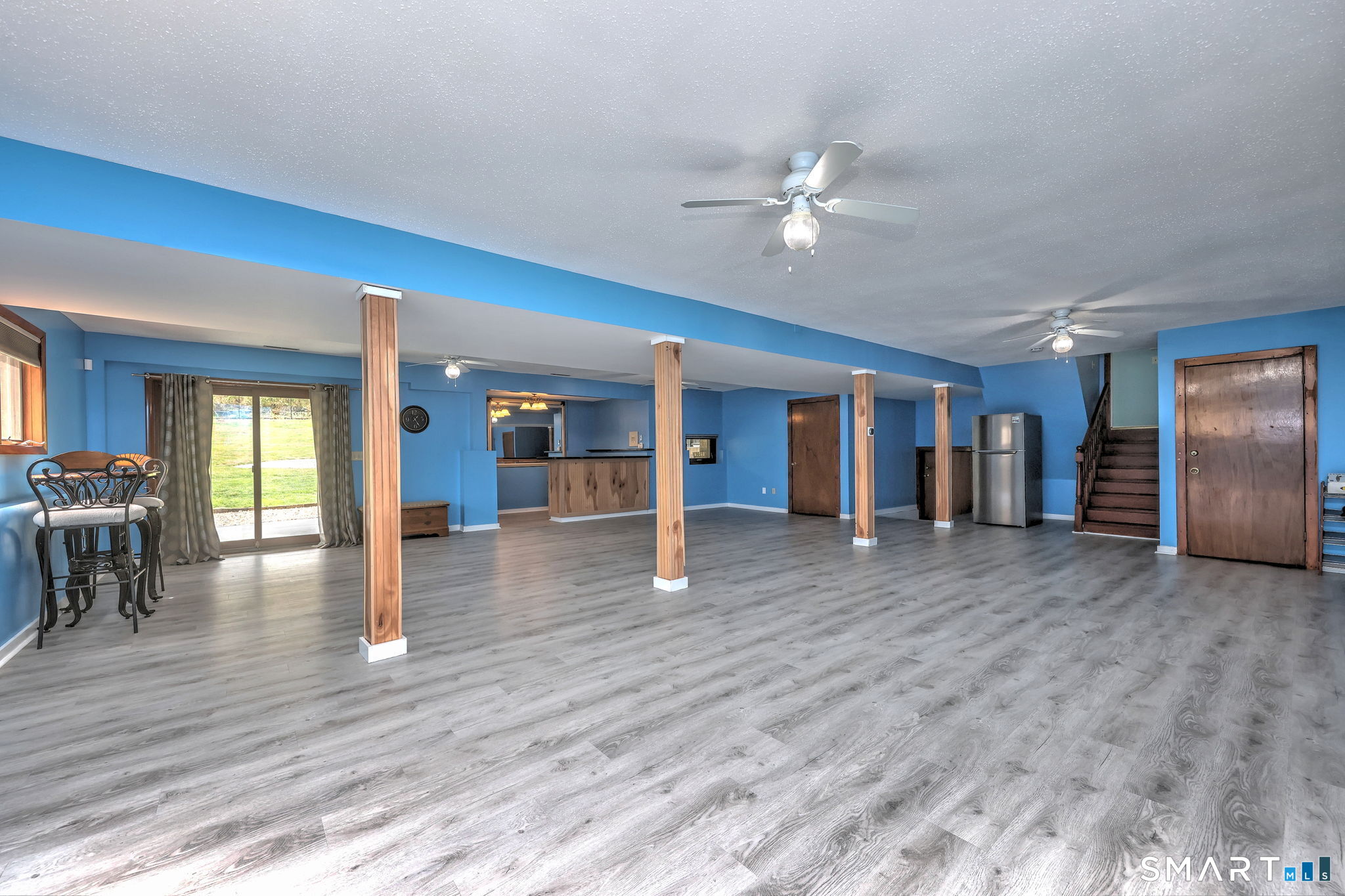 2262 Ridge Road North Haven, CT 06473 - Photo 15 of 40 a view of empty room with wooden floor and window