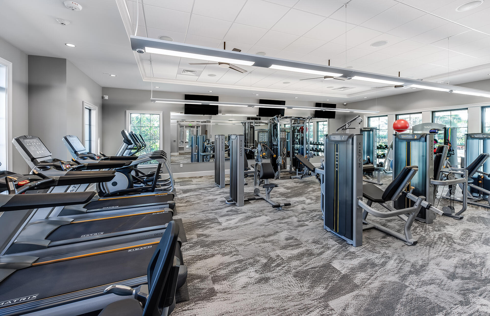 4340 Southwest Cornerstone Way, Unit WHITESTONE 136 Stuart, FL 34997 - Photo 29 of 34 a view of a room with gym equipment