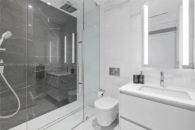 a view of a chairs and table in the patio