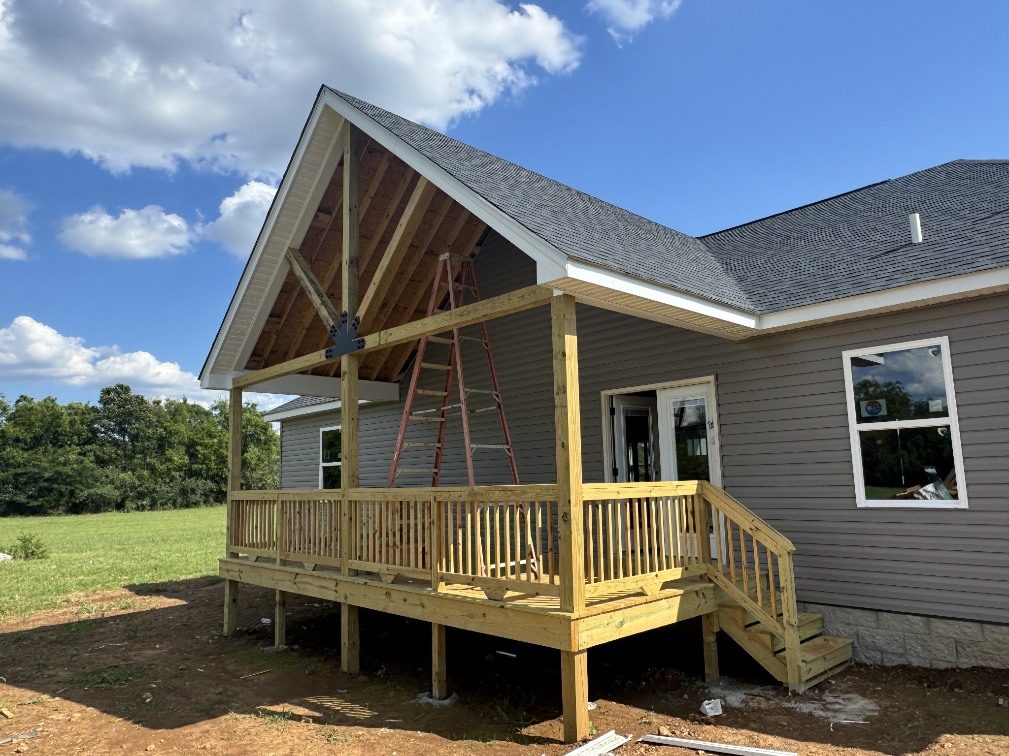 2108 Laws Hill Road Lewisburg, TN 37091 - Photo 4 of 29 a view of house with a roof deck