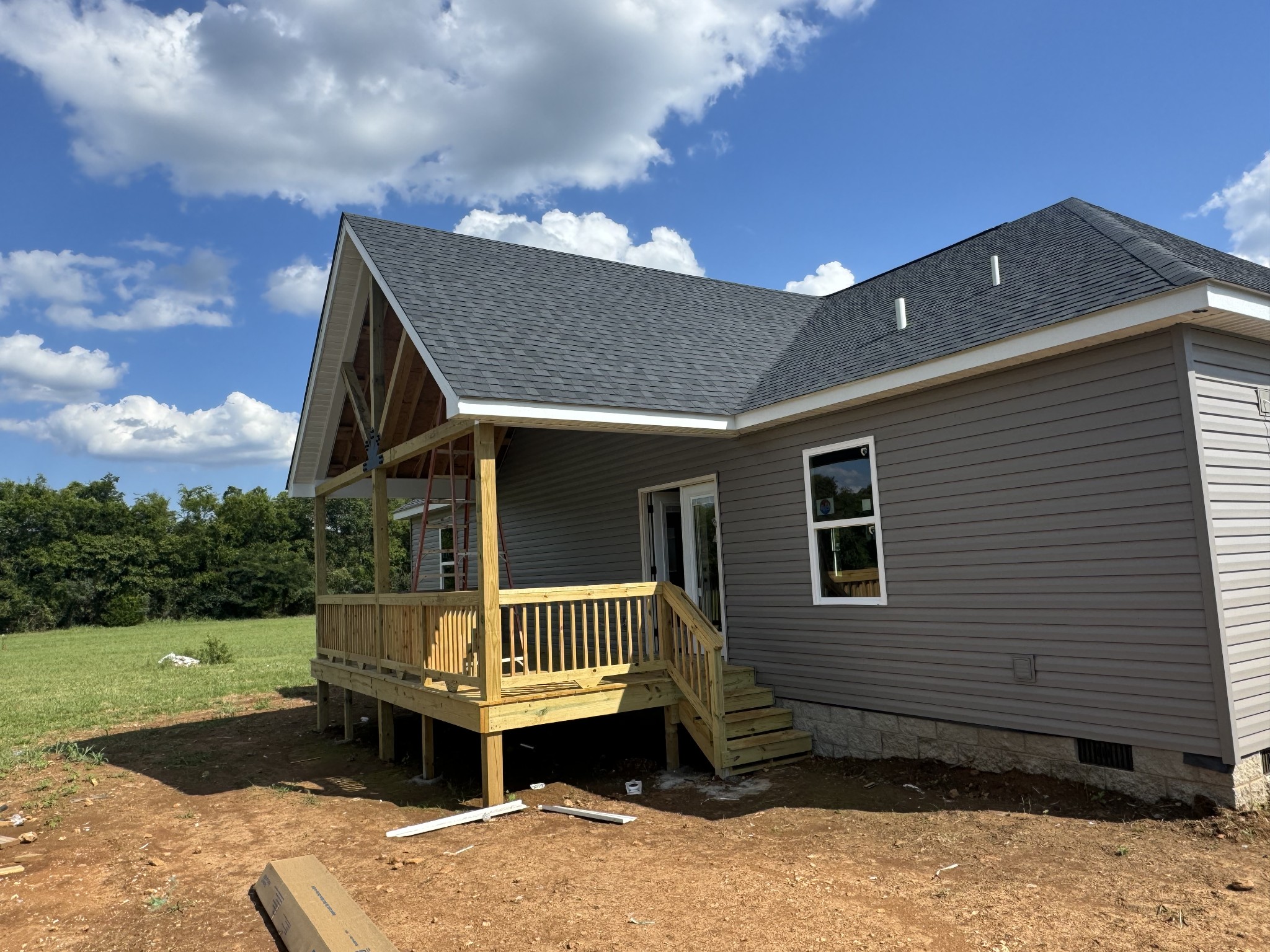 2108 Laws Hill Road Lewisburg, TN 37091 - Photo 5 of 29 a front view of a house with a yard