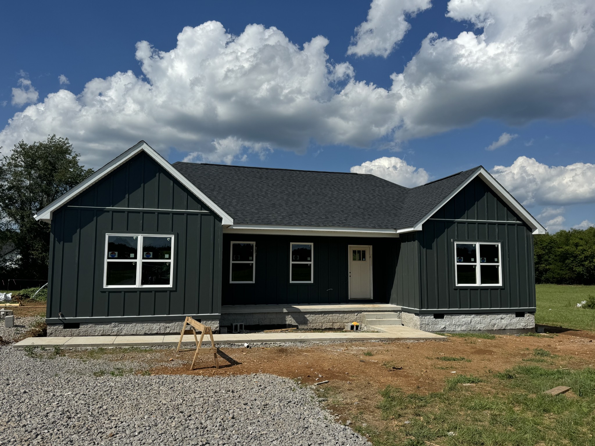 2108 Laws Hill Road Lewisburg, TN 37091 - Photo 6 of 29 a front view of a house with a yard and garage