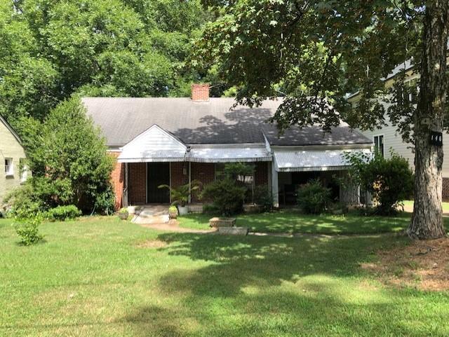 146 McClean Street Decatur, GA 30030 - Photo 1 of 1 a backyard of a house with yard and tree