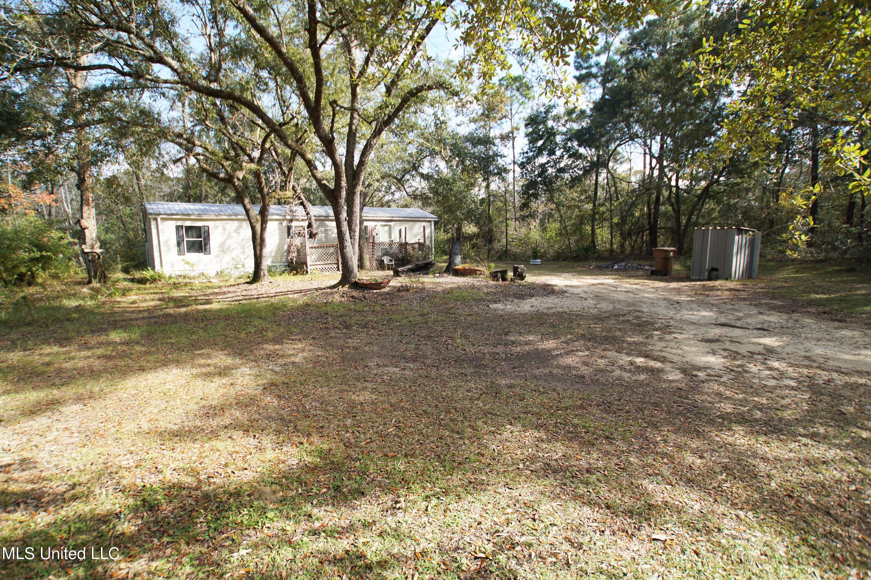 8270 Henley Road Pass Christian, MS 39571 - Photo 1 of 11 Front 2