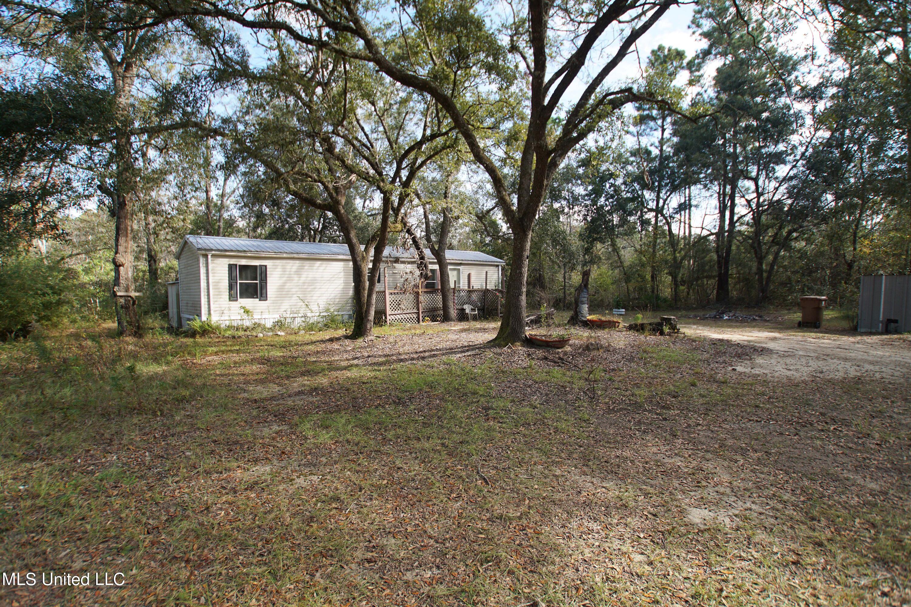 8270 Henley Road Pass Christian, MS 39571 - Photo 2 of 11 Front 1