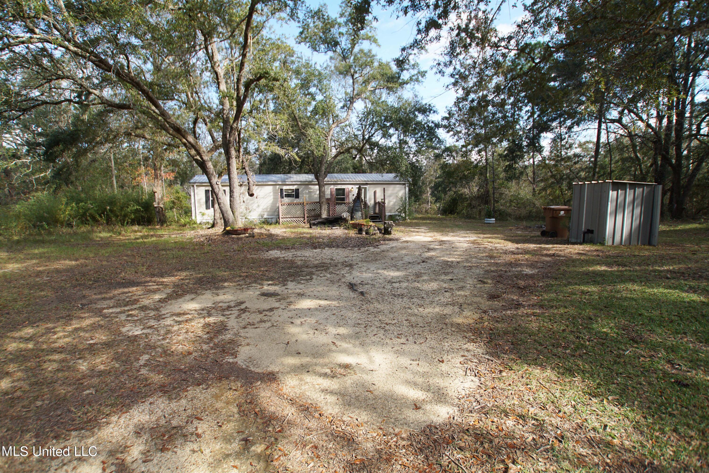 8270 Henley Road Pass Christian, MS 39571 - Photo 3 of 11 Front 3