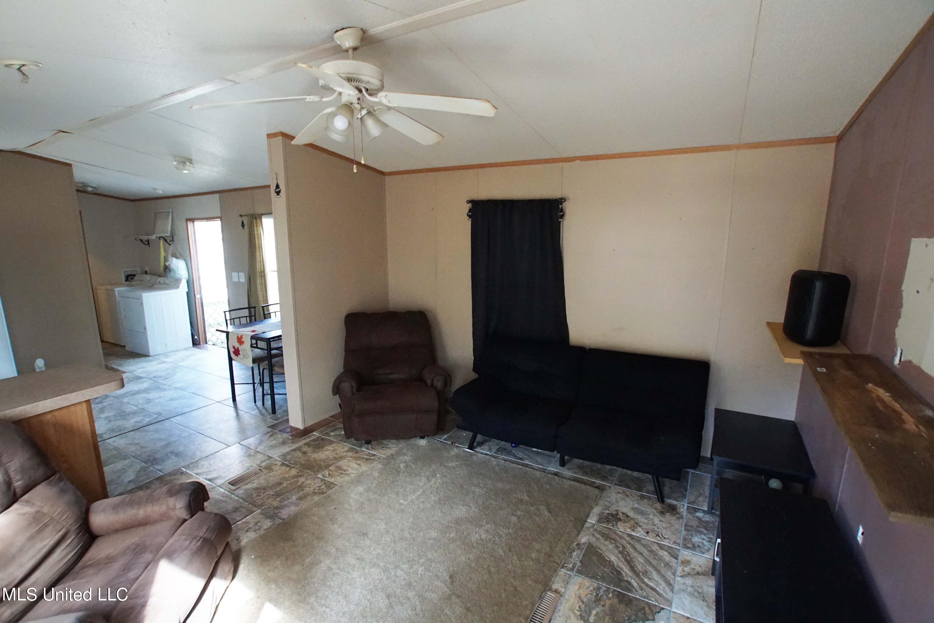 8270 Henley Road Pass Christian, MS 39571 - Photo 4 of 11 Living 2