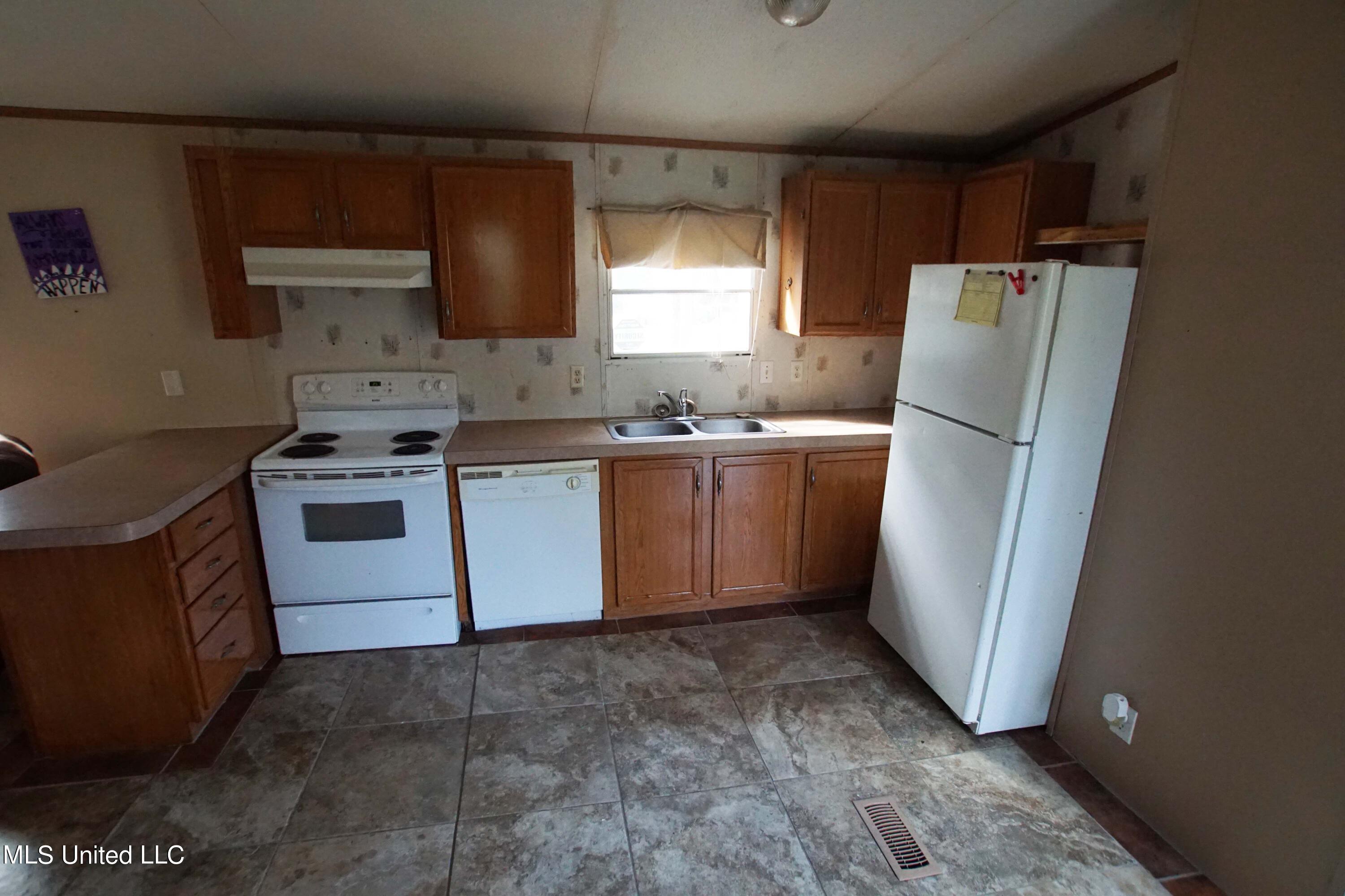 8270 Henley Road Pass Christian, MS 39571 - Photo 7 of 11 kitchen 1