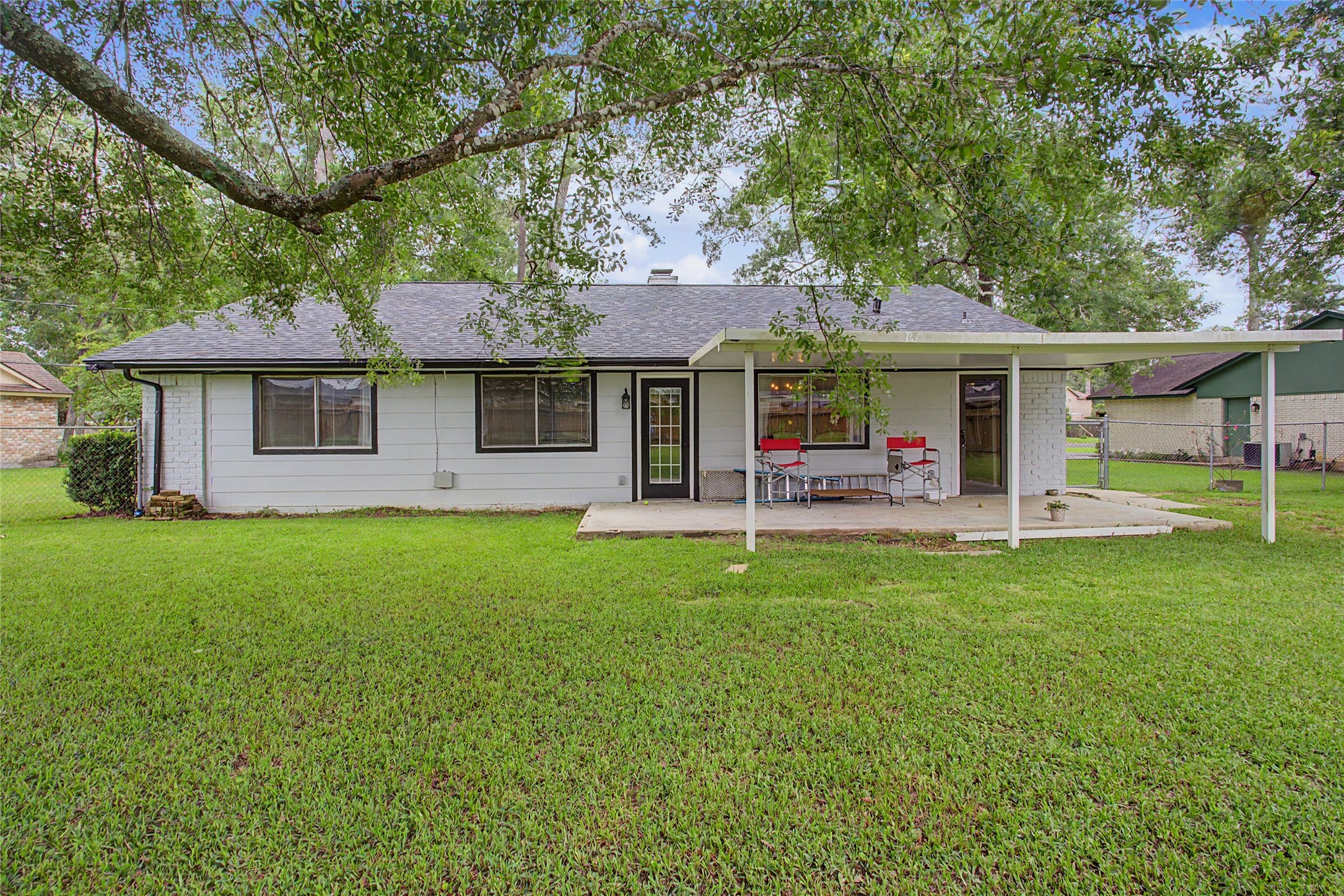 327 Fir Ridge Drive Huffman, TX 77336 - Photo 18 of 25 Enjoy your large covered back patio.