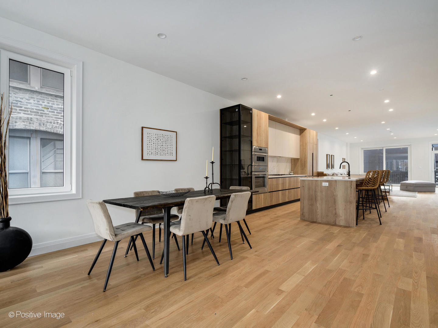 2651 West Augusta Boulevard, Unit 1 Chicago, IL 60622 - Photo 5 of 20 a view of a dining room with furniture and wooden floor