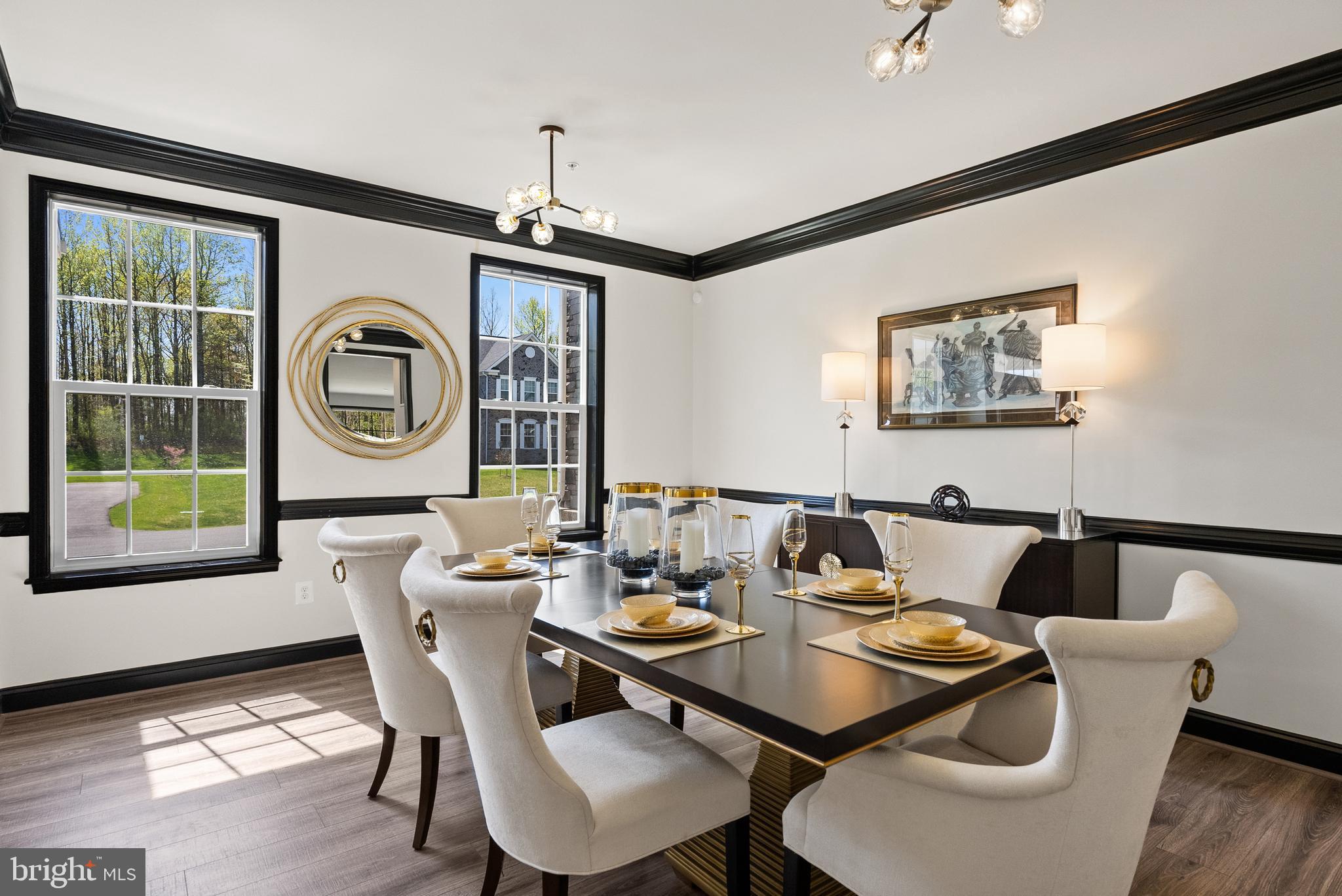 4012 Diamondhead Avenue Bowie, MD 20721 - Photo 14 of 96 a dining room with furniture a rug and wooden floor