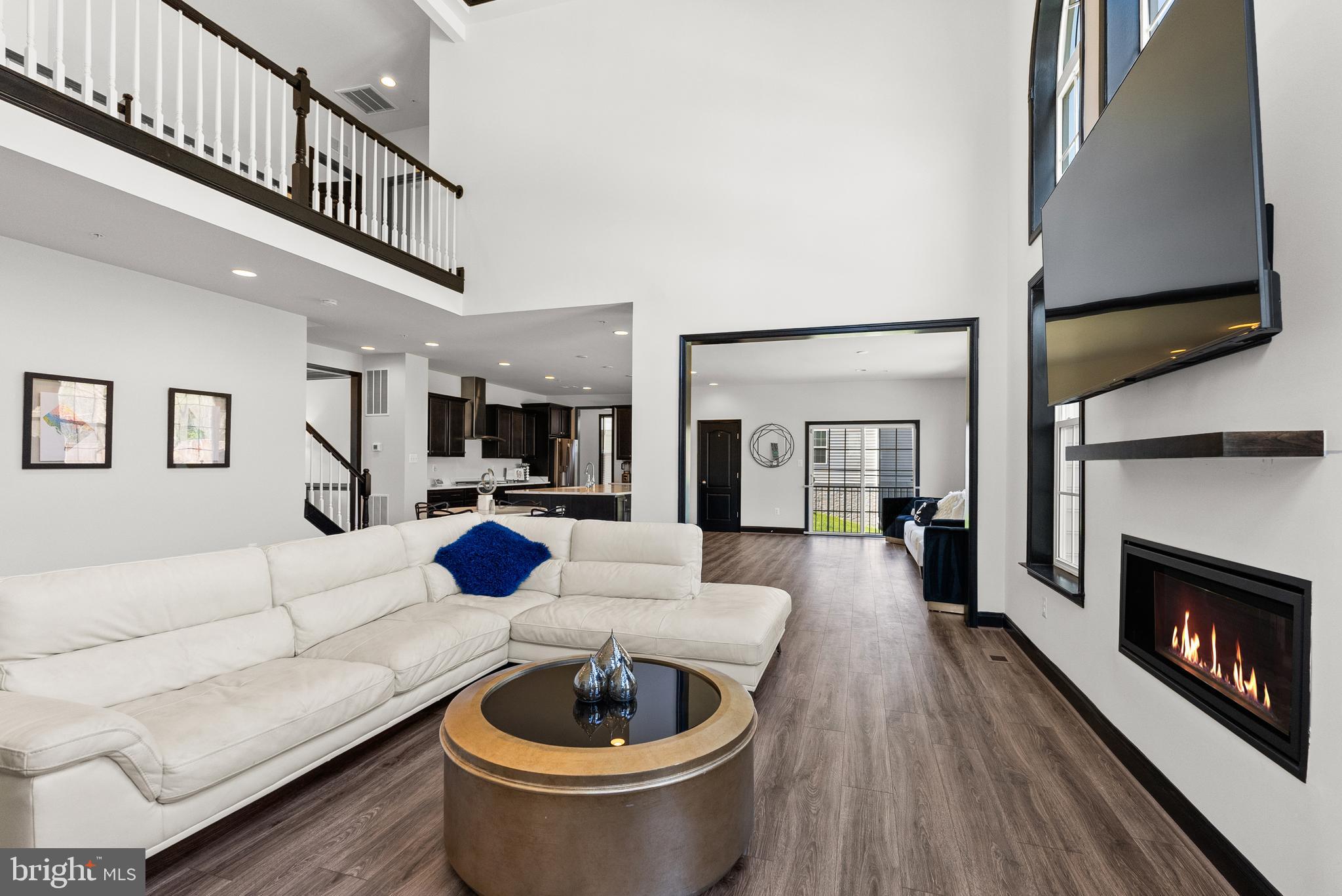 4012 Diamondhead Avenue Bowie, MD 20721 - Photo 19 of 96 a living room with furniture and a fireplace