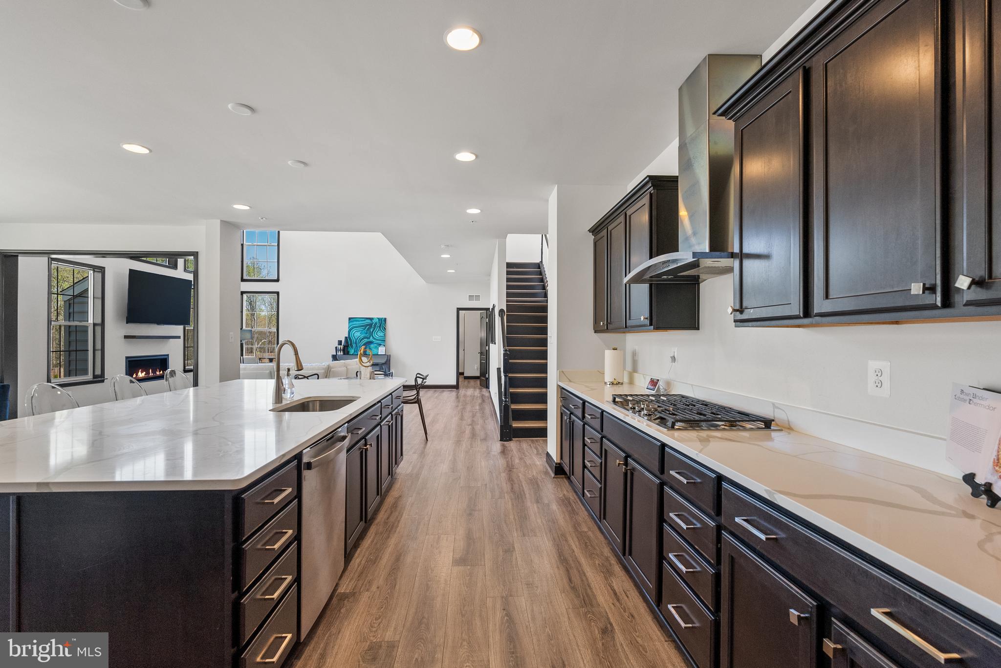 4012 Diamondhead Avenue Bowie, MD 20721 - Photo 28 of 96 a kitchen with stainless steel appliances granite countertop a sink stove and refrigerator