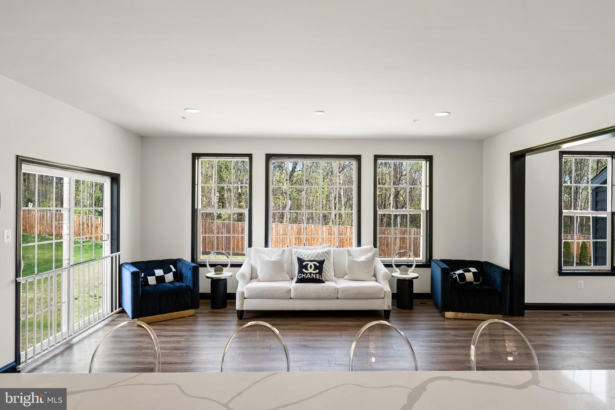 4012 Diamondhead Avenue Bowie, MD 20721 - Photo 33 of 96 a living room with furniture and large windows