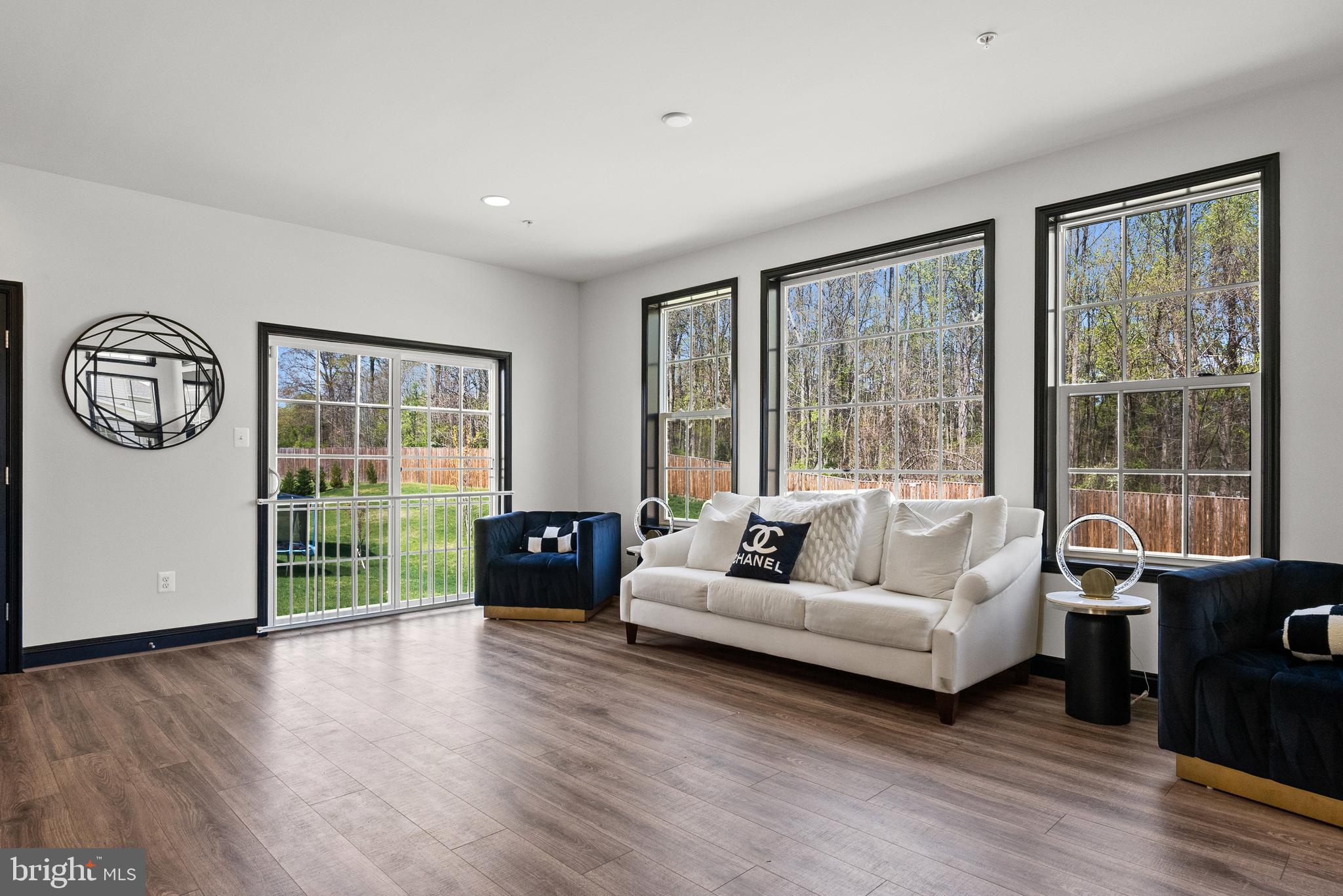 4012 Diamondhead Avenue Bowie, MD 20721 - Photo 34 of 96 a living room with furniture and a large window