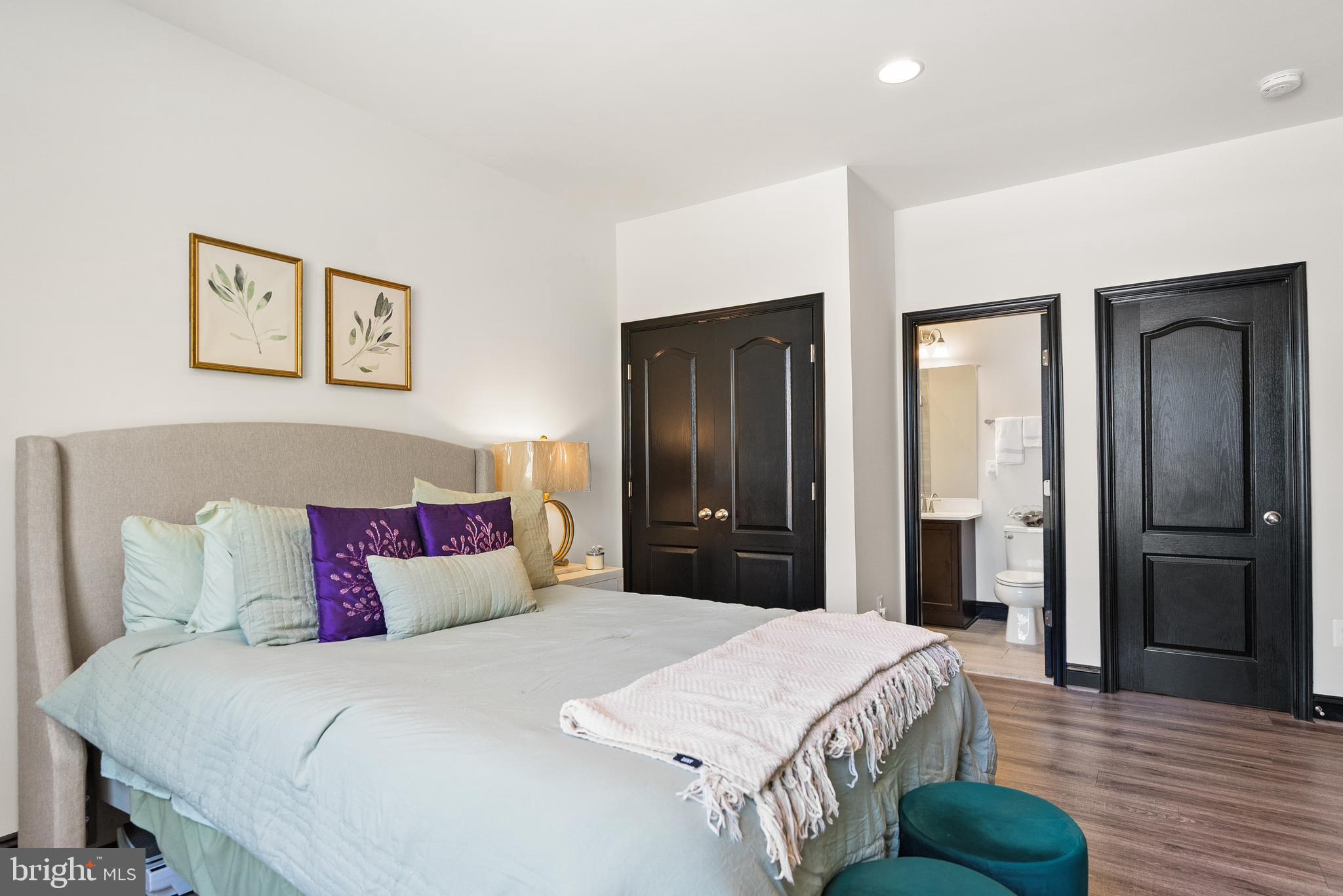 4012 Diamondhead Avenue Bowie, MD 20721 - Photo 37 of 96 a bedroom with a bed and wooden floor