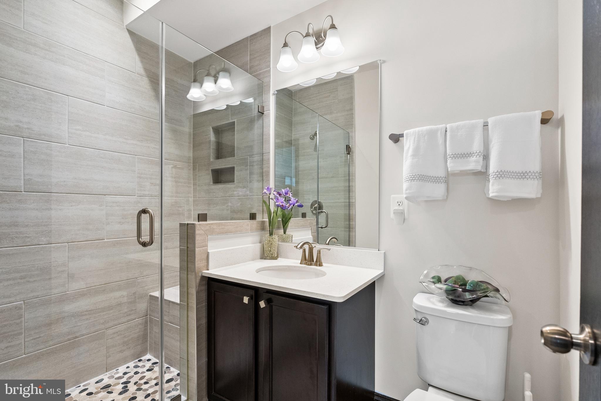 4012 Diamondhead Avenue Bowie, MD 20721 - Photo 38 of 96 a bathroom with a sink vanity and a mirror