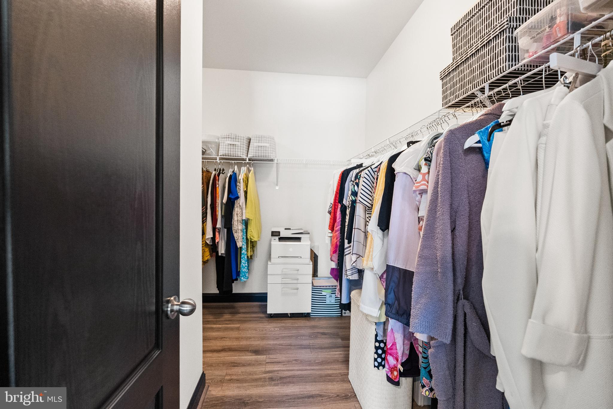 4012 Diamondhead Avenue Bowie, MD 20721 - Photo 40 of 96 a view of walk in closet with clothes and shoes