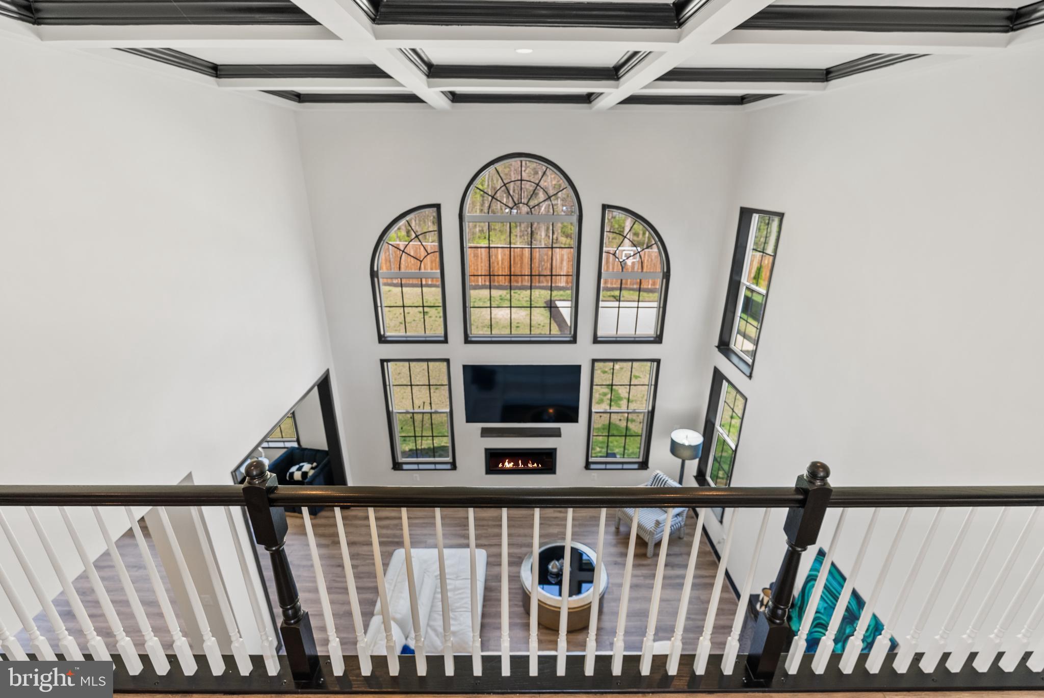 4012 Diamondhead Avenue Bowie, MD 20721 - Photo 42 of 96 a view of staircase with railing and a wooden floor