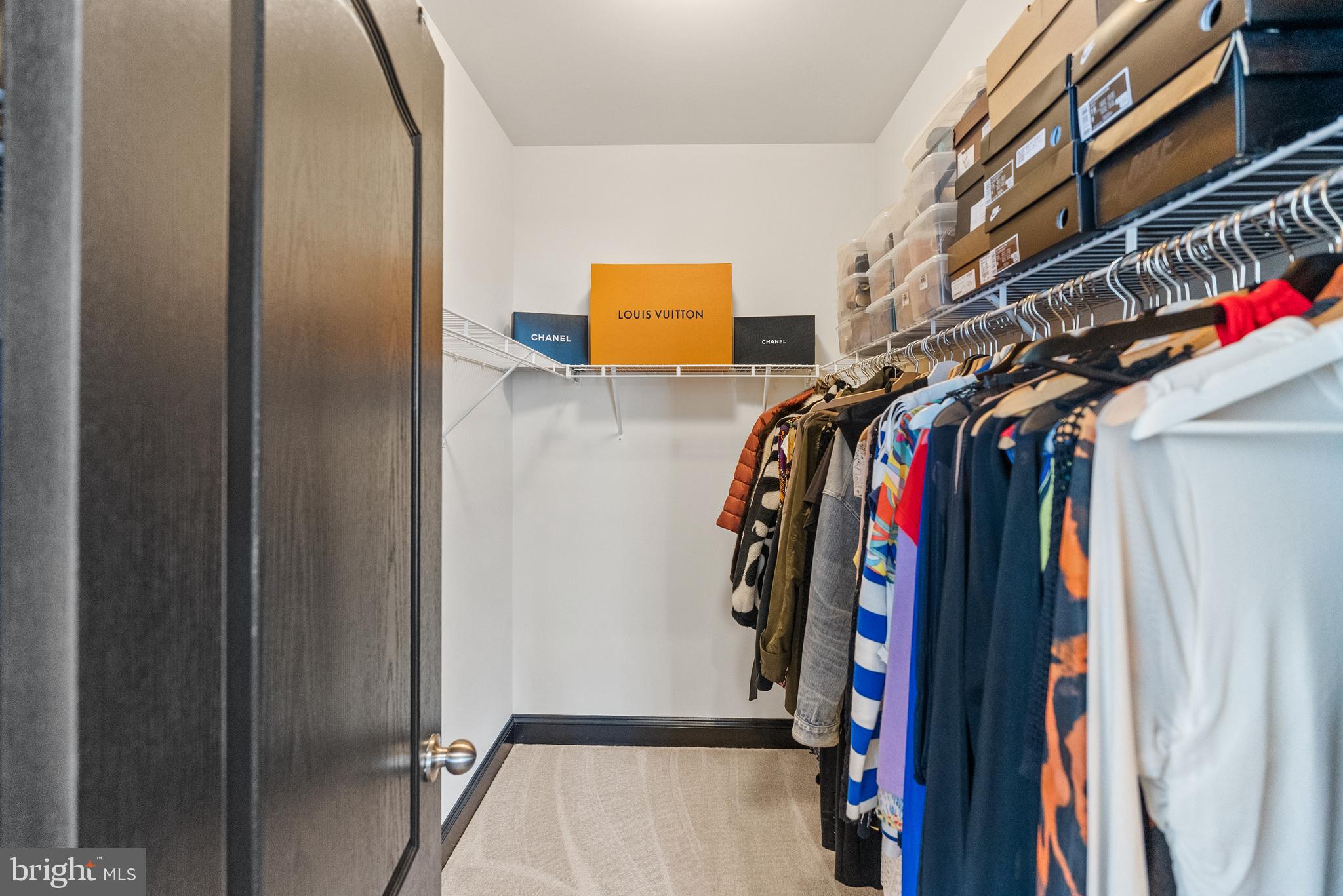 4012 Diamondhead Avenue Bowie, MD 20721 - Photo 47 of 96 a view of walk in closet with clothes
