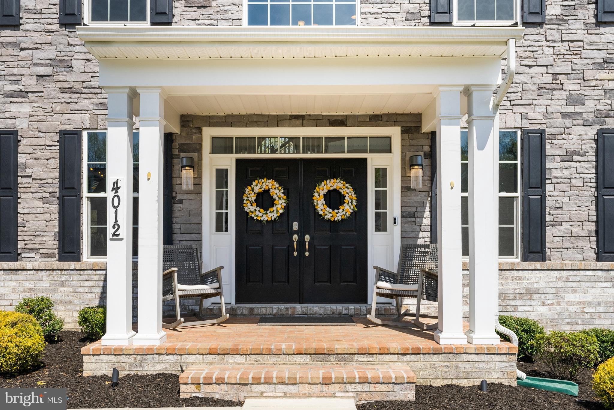 4012 Diamondhead Avenue Bowie, MD 20721 - Photo 5 of 96 a front view of a building with a sign board