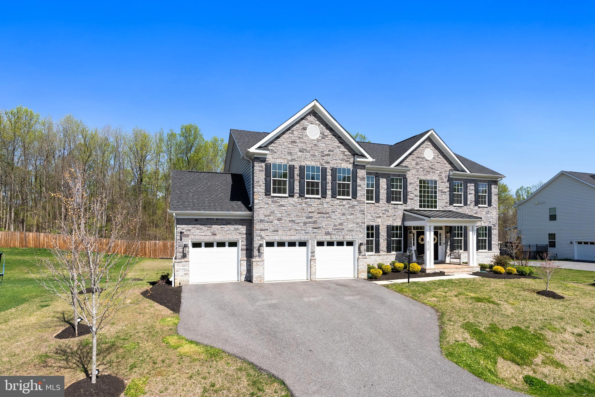 4012 Diamondhead Avenue Bowie, MD 20721 - Photo 6 of 96 a front view of a house with a yard