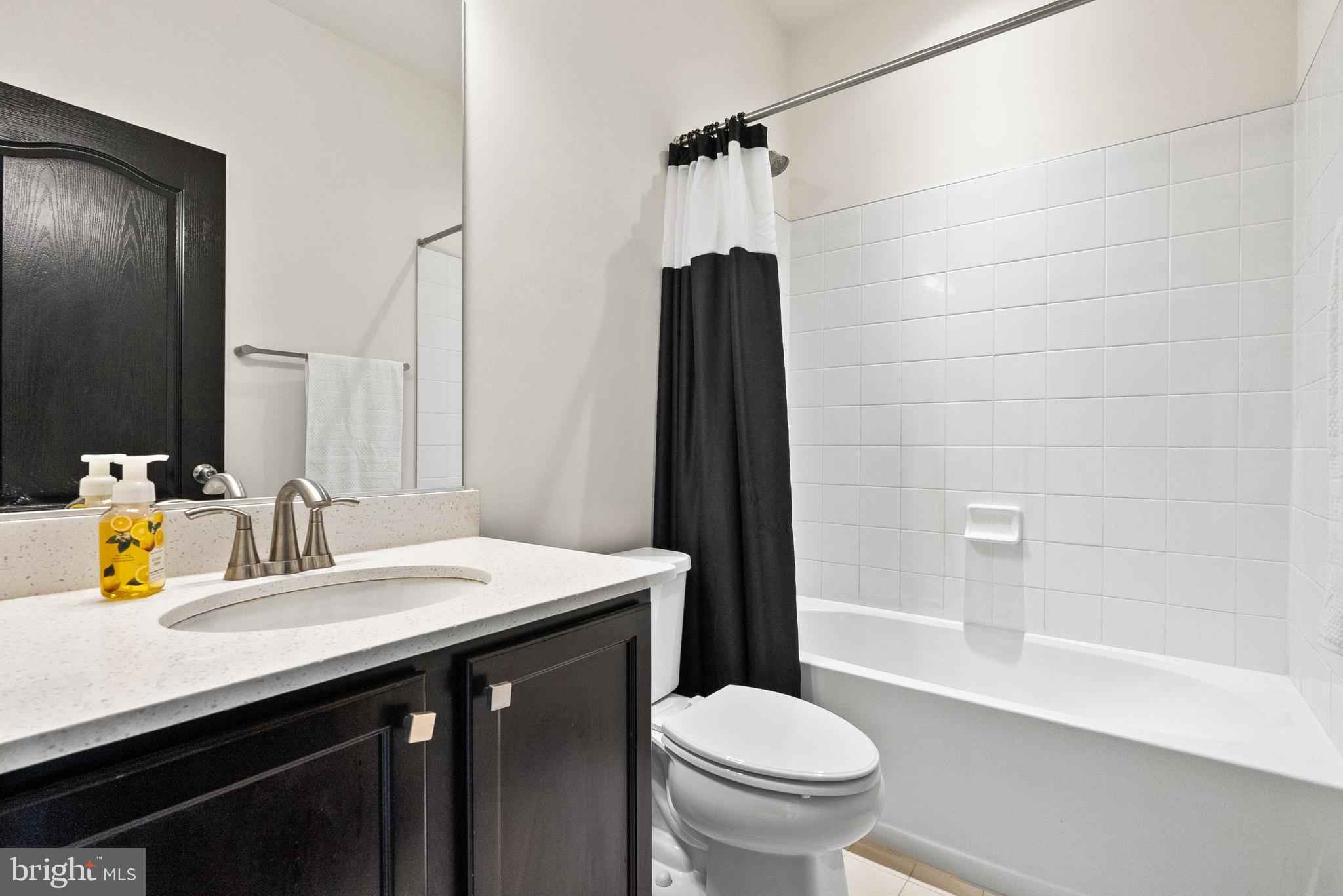 4012 Diamondhead Avenue Bowie, MD 20721 - Photo 63 of 96 a bathroom with a sink a toilet and shower