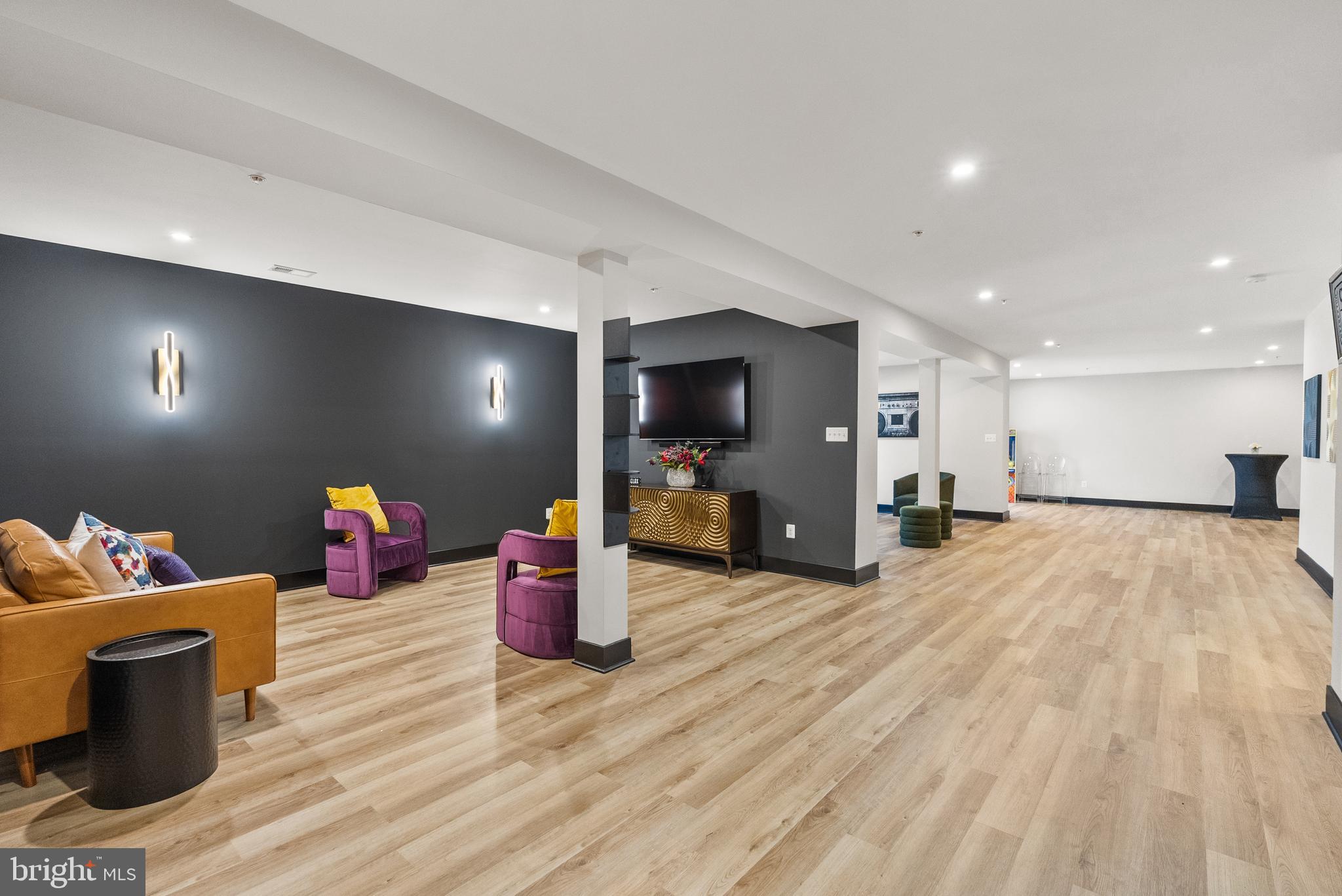 4012 Diamondhead Avenue Bowie, MD 20721 - Photo 68 of 96 a living room with furniture and a flat screen tv