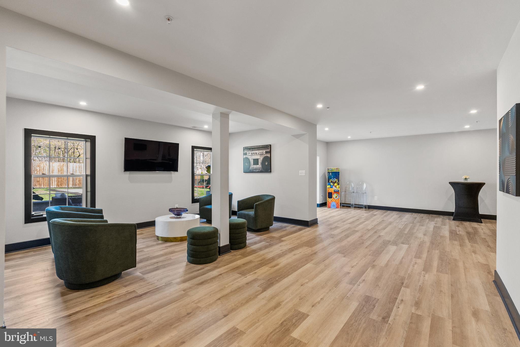 4012 Diamondhead Avenue Bowie, MD 20721 - Photo 71 of 96 a living room with furniture a flat screen tv and a fireplace