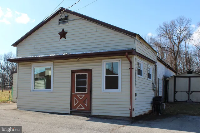 a front view of a house with a garage