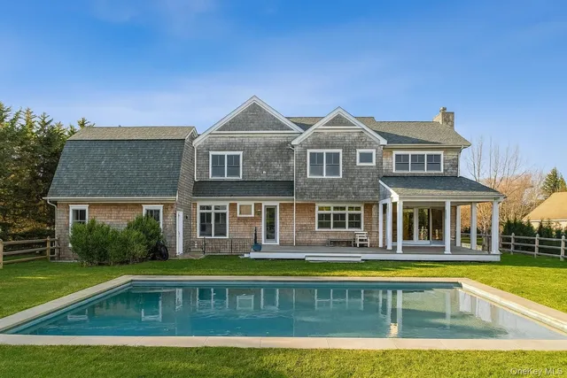 a view of a house with a swimming pool