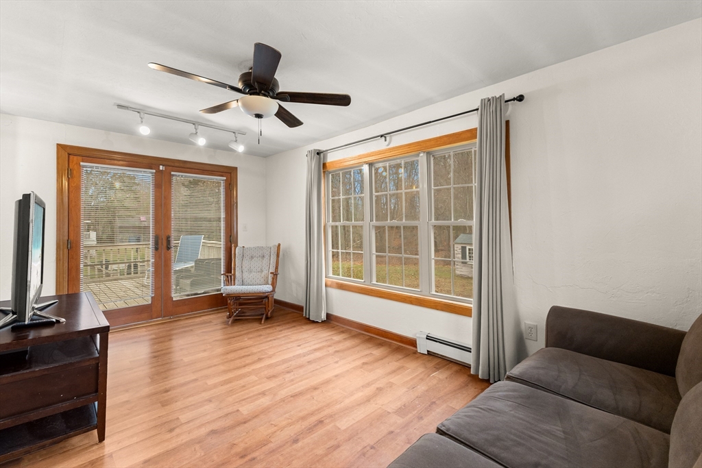 70 Dillingham Way Hanover, MA 02339 - Photo 22 of 42 a living room with furniture and a large window