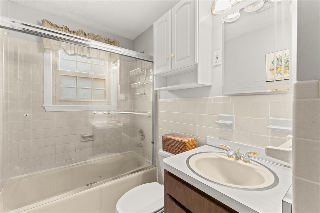 70 Dillingham Way Hanover, MA 02339 - Photo 32 of 42 a bathroom with a sink toilet and shower