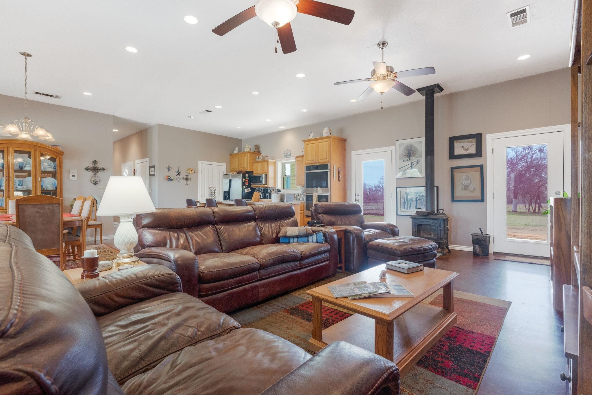 8089 East Fm 580 Kempner, TX 76539 - Photo 13 of 30 a living room with furniture and a chandelier