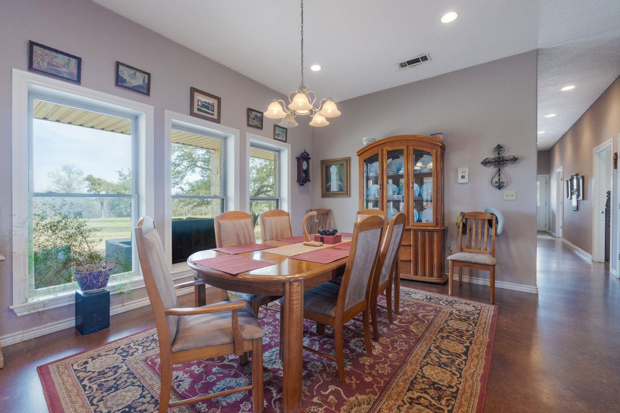 8089 East Fm 580 Kempner, TX 76539 - Photo 15 of 30 a view of a dining room with furniture window and wooden floor