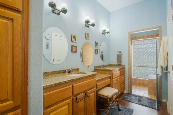 a room with a mirror and furniture