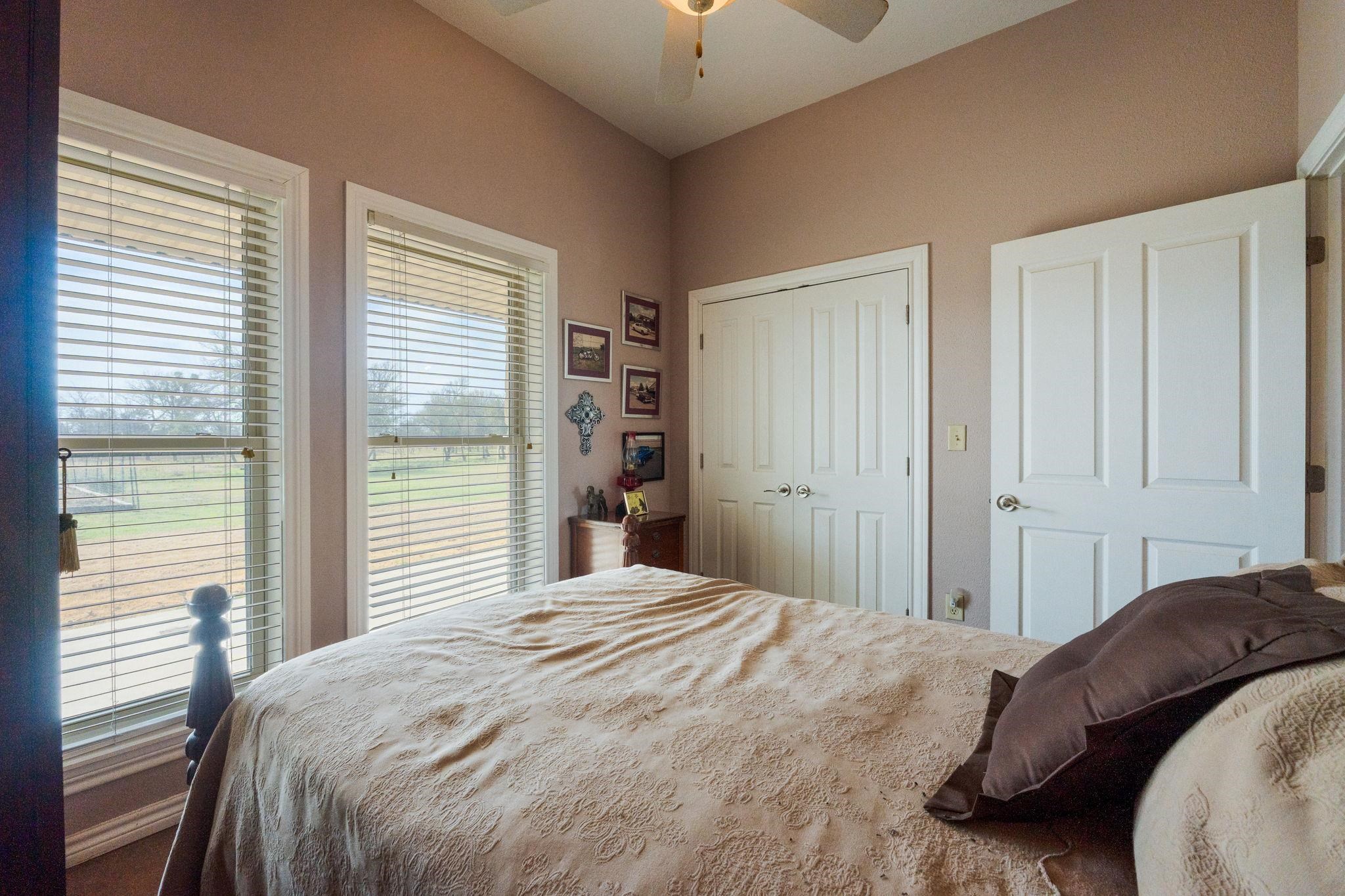 8089 East Fm 580 Kempner, TX 76539 - Photo 27 of 30 a bedroom with a bed and a chandelier