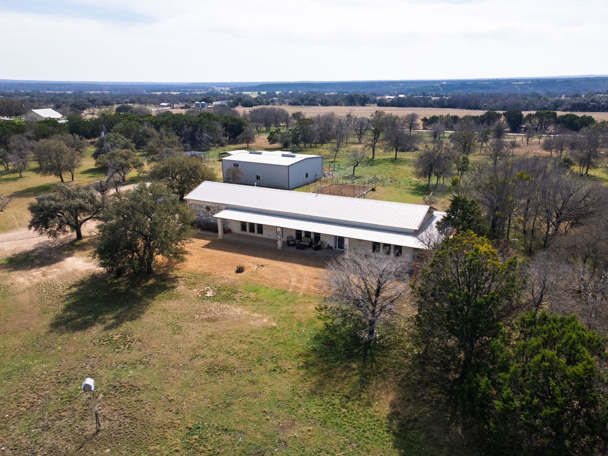 8089 East Fm 580 Kempner, TX 76539 - Photo 10 of 30 an aerial view of a house with a yard and lake view