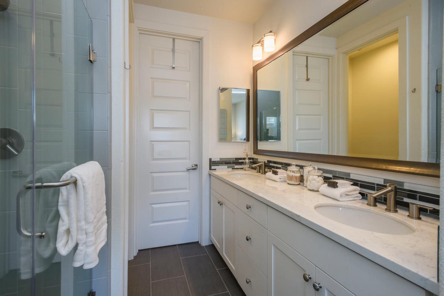 2906 Shoemaker Dr. San Mateo, CA 94403 - Photo 15 of 20 a bathroom with a double vanity sink a and mirror
